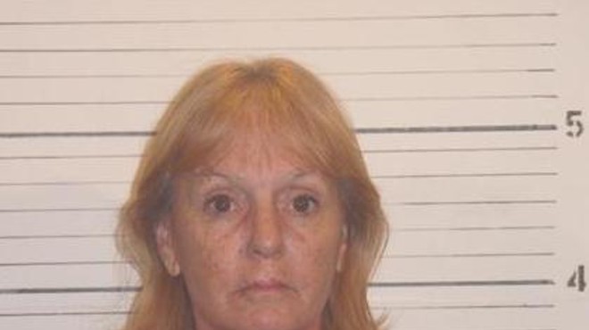 Prosecutors say Donna MrKacek covered up the murder of her young lover.