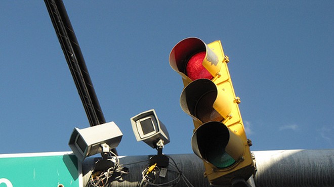 Don't like stopping at red lights? Please don't drive, says St. Louis' city counselor.