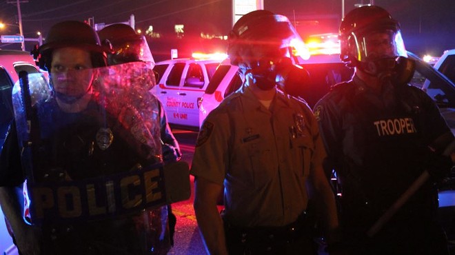 Police in riot gear and gas masks have been deployed to West Florissant Avenue each night since protests began.