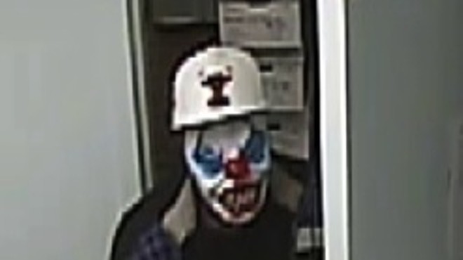 Robber in clown mask caught on camera.
