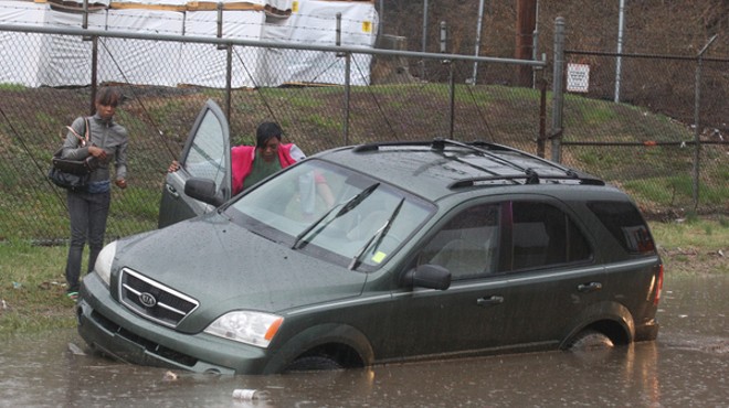 Three cars were stranded after heavy rains Wednesday. No injuries were reported.