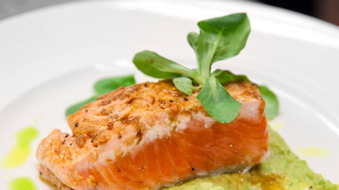Copper River salmon a la Plancha with a soy-ginger glaze, black carrots and puree of English peas. | St. Louis Magazine
