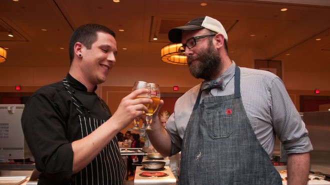 Chefs Brian Coltrain and John Perkins cheers with the secret ingredient, Stella Artois. | Micah Usher