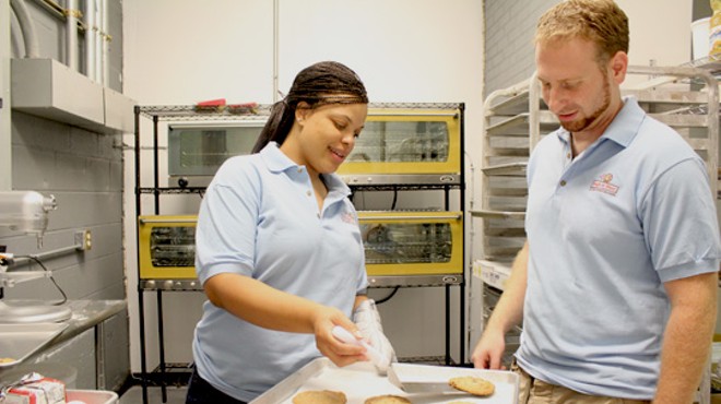 Managing partners Tamika Moore and Jonathan Weinberg in the kitchen