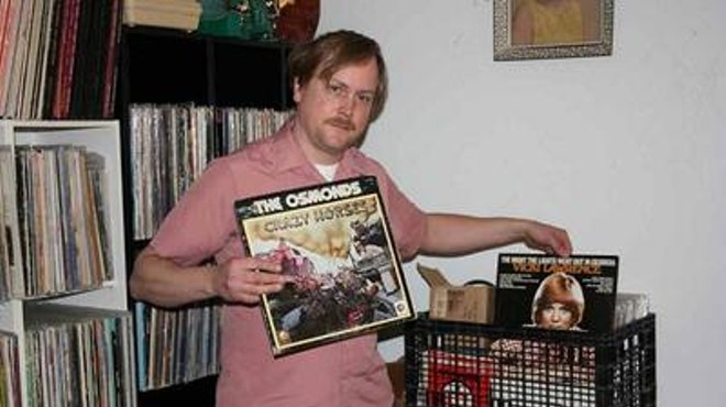 Matt Harnish with a small sample of his expansive record collection