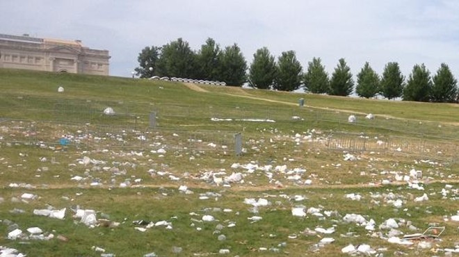 Art Hill littered with food containers and bottles from Kinfolks Soul Food Festival.