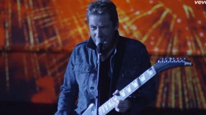 Chad Kroeger of Nickelback is making that face because he's thinking really hard about Ferguson.