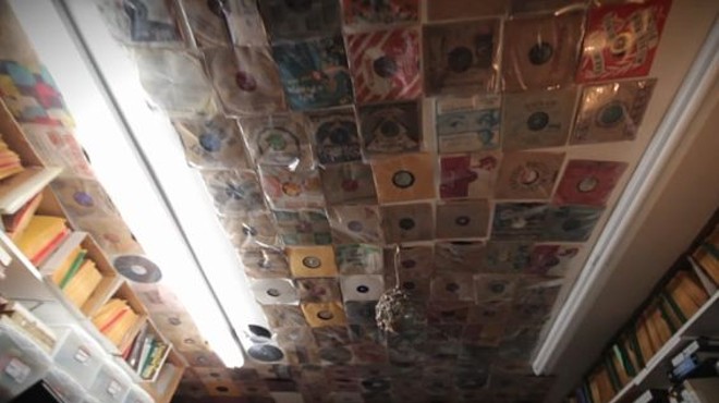 Tussey has so many records, he keeps some on the ceiling. He calls it his Sistine Chapel.