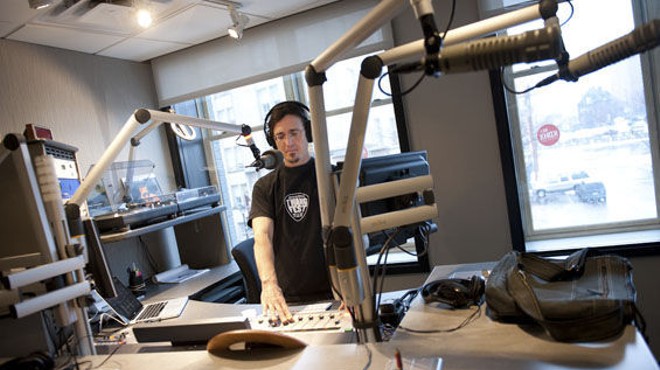 KDHX's Andy Coco broadcasting from the studios of the station's newly opened Larry J. Weir Center for Independent Media.