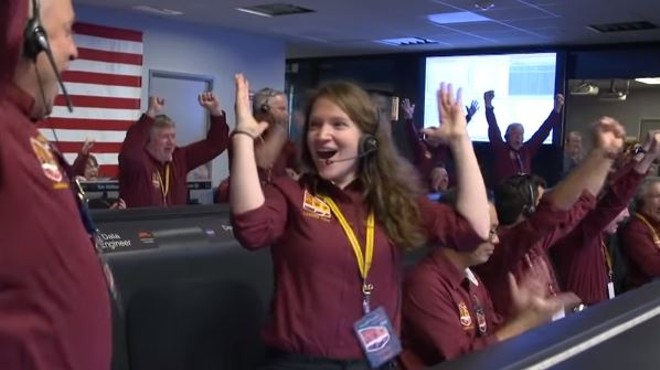 University of Missouri grad Brooke Harper and a fellow NASA engineer celebrate InSight's landing.