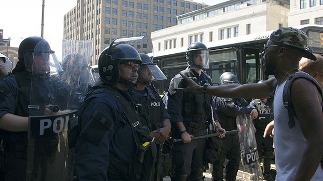 Officers in riot gear respond to a protest in September 2017.
