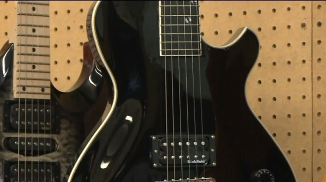 Blake Shelton model guitars, like this one shown in a Fox2 video, were stolen.