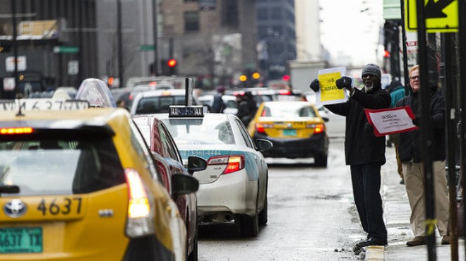 Taxi drivers in Chicago protest Uber.
