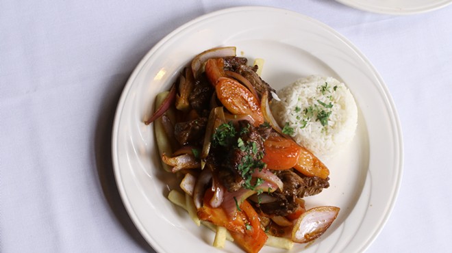 Lomo Saltado: Sauteed tenderloin steak, served with onions, tomatoes, rice and fries.