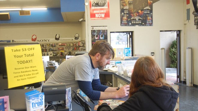 Scott Burk assisting a customer.