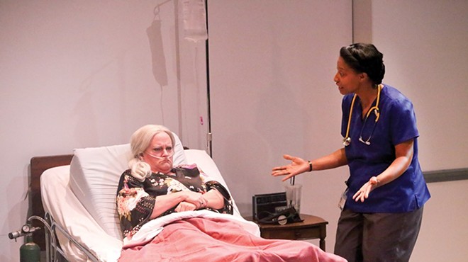 Maxine (Kim Furlow) and Tina (Jeanitta Perkins) argue about Maxine's care.