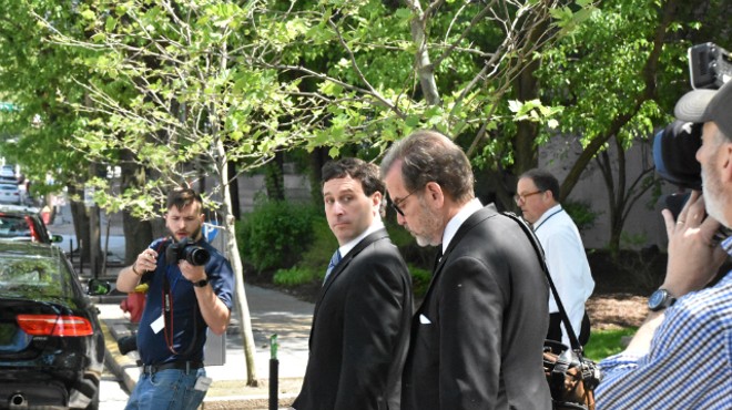 Steve Stenger (left) leaves the federal courthouse in April with his attorney, Scott Rosenblum.