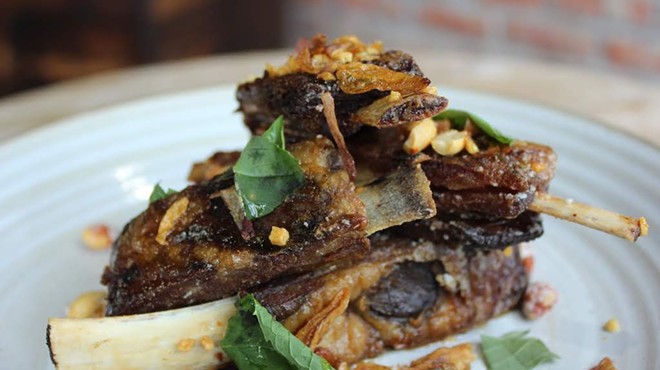 Lamb ribs garnished with candied peanuts will be served at Indo.