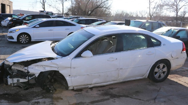 A stolen sedan was in bad shape following a collision with another stolen vehicle.