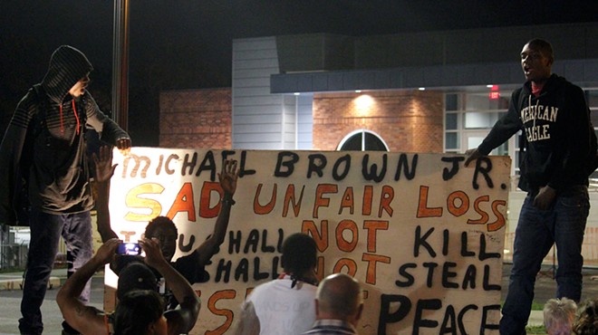 Protesters gathered outside the Ferguson Police Department on September 26, 2014.