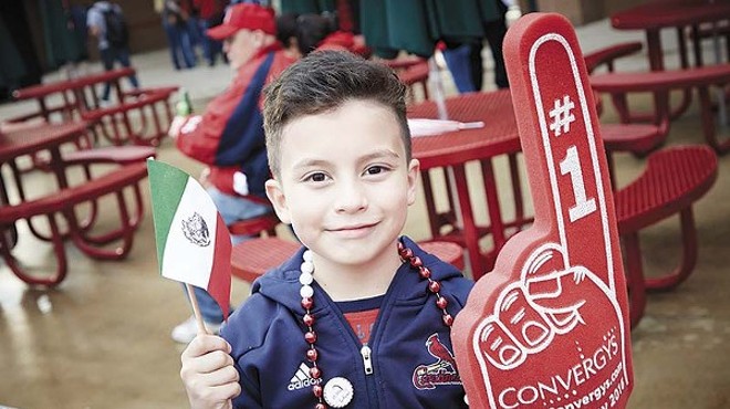 A young Cardinals' fan shows off his Mexican pride at "Fiesta Cardenales."