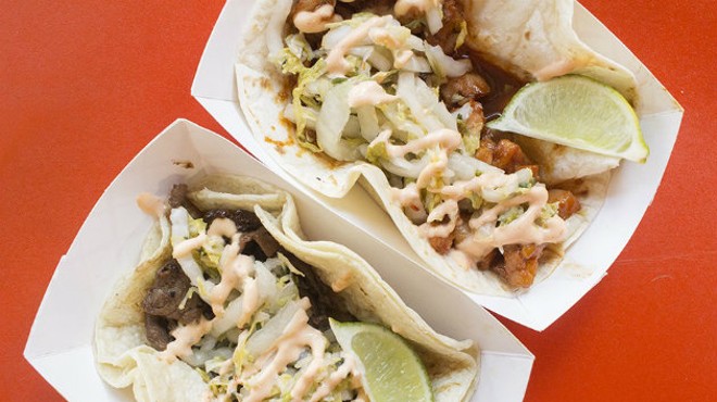 Boneless beef short rib and sweet-and-spicy chicken tacos with Asian slaw and aioli.