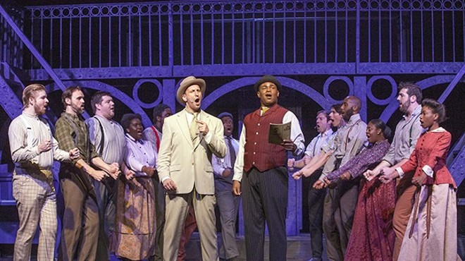 Henry Ford (Jason Meyers) and Coalhouse (Omega Jones) sing about achieving success by never giving up.