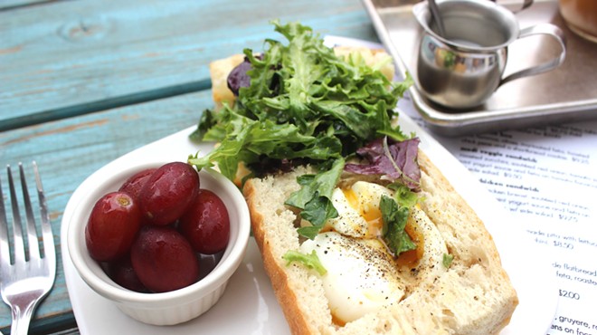 The workday sandwich with soft-boiled egg and greens on baguette.