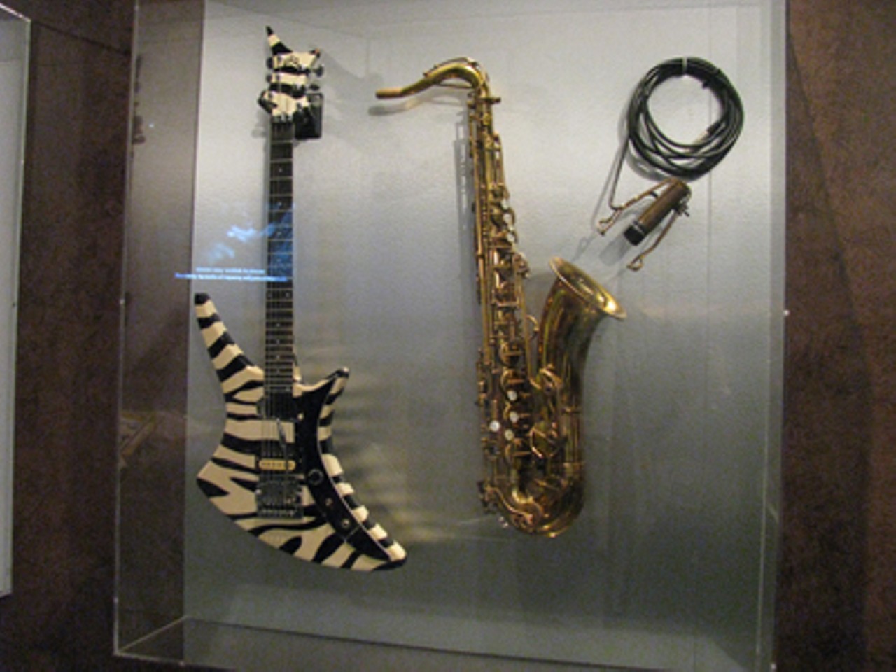 Two of Bruce Springsteen and the E Street Band's instruments: Clarence Clemons&rsquo; saxophone, of course, is on the right.