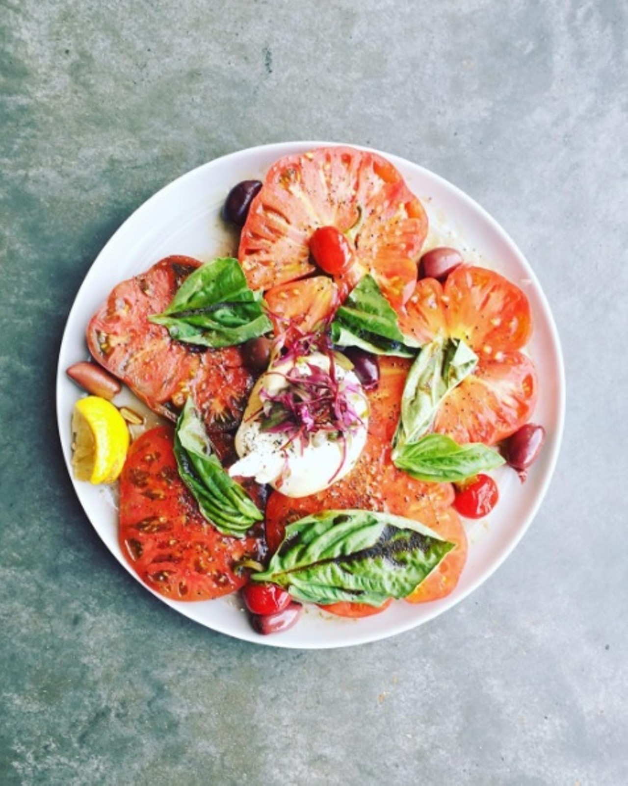 Sherrie Castellano
Instagram: withfoodandlove
Blog: withfoodandlove.com
A transplant from the East Coast, Castellano's blog focuses on gluten-free and vegetarian recipes. Pictured: heirlooms and burrata at Katie's Pizza and Pasta (9568 Manchester Rd., 314-942-6555). Photo courtesy of Instagram / withfoodandlove.