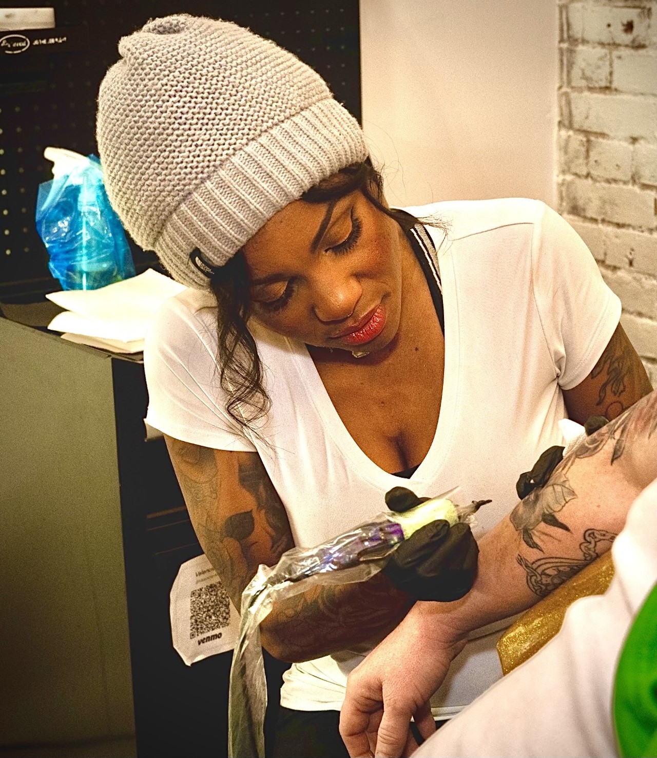 Valencia Miller
The bubbly Miller, who can boast of being the first Black woman to own a tattoo shop in the city, brought her shop to Lafayette Square in 2021. She's known for her portraits, floral and all-organic subject matter.
Shop details: Onyx Dagger (1917 Park Avenue, text or call 314-745-8641); open 11 a.m. to 7 p.m. Tuesday through Sunday
Appointments or Walk-ins: Appointment only
Years tattooing: Over 16 years
Specialty: Black and gray realism, fine line, portraiture, floral and organic subject matter
To note:
Will take on different tattoo styles
No face tattoos
No minors
$$$: Minimum ranges from $150 to $300 depending on the artist
Best way to contact: Shop&rsquo;s website