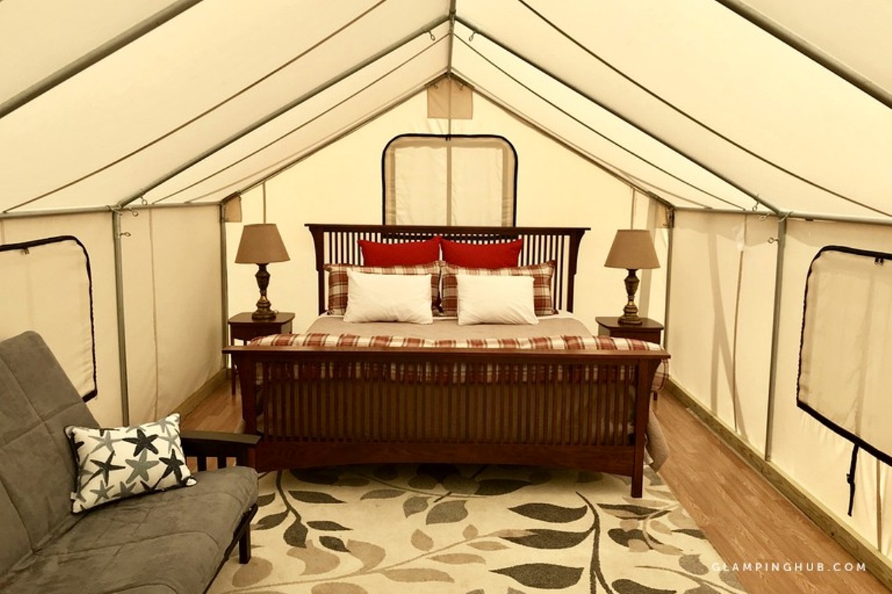 Romantic Glamping Getaway in Safari Tent on Mississippi River near St. Louis, Missouri
"Inside the tent, sleep will come easy, thanks to the king-size bed outfitted with crisp, clean sheets and fluffy pillows. There is also a futon that converts into a full-size bed. The tent is heated in the spring and fall, as well as air-conditioned in the summer, to ensure year-round comfort."
Book this unit at GlampingHub.com