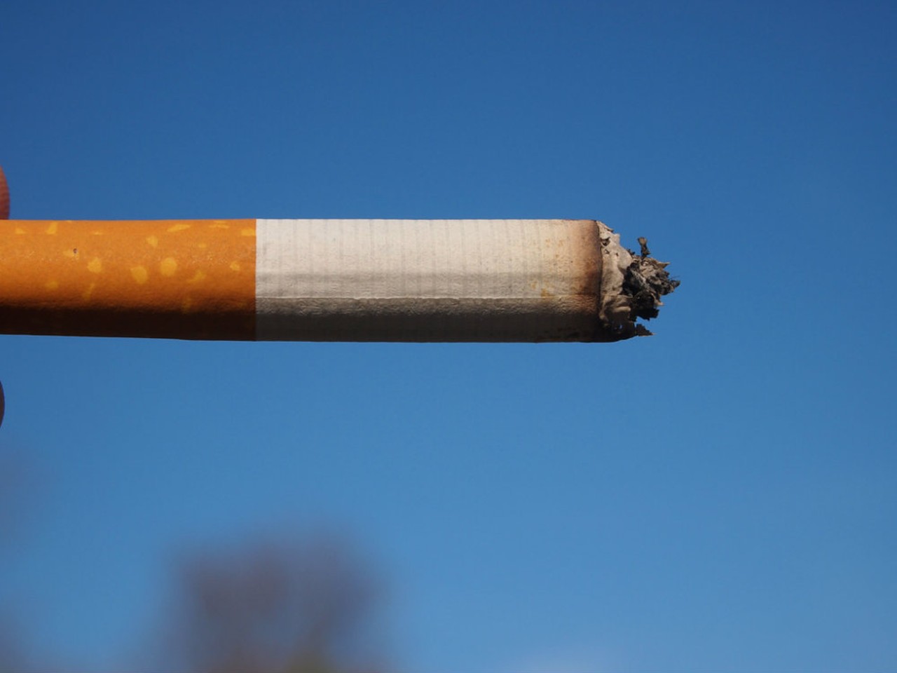 It's too cold for grabbing that second -- or even a first -- cigarette outside, so a bunch of people are irritated.
But at least they're somewhat healthier? Photo courtesy of Flickr / Fried Dough.