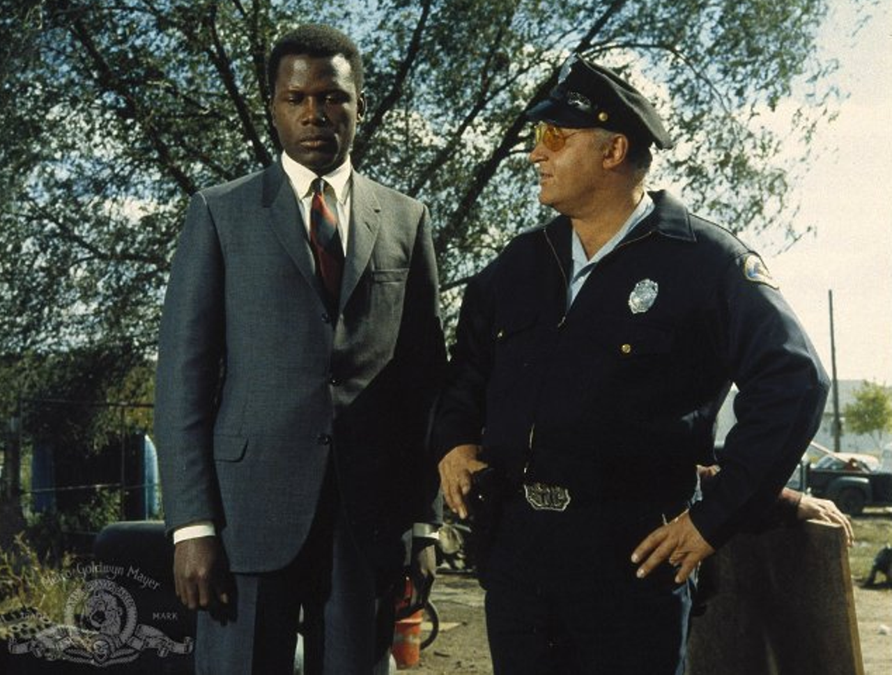 In the Heat of the Night (1967)
A winner of five Academy Awards -- but not one for Sidney Poitier's powerful performance -- In the Heat of the Night pairs Poitier's Detective Virgil Tibbs with Rod Steiger's Police Chief Bill Gillespie. "Now just what do you do up there in Pennsylvania to earn that kind of money?" asks an incredulous Gillespie about money found on Tibbs, to which Tibbs responds, "I'm a police officer." The two work together to solve a murder, but only after Tibbs' police chief back in Philadelphia tells him to stay in Mississippi to solve the crime.
