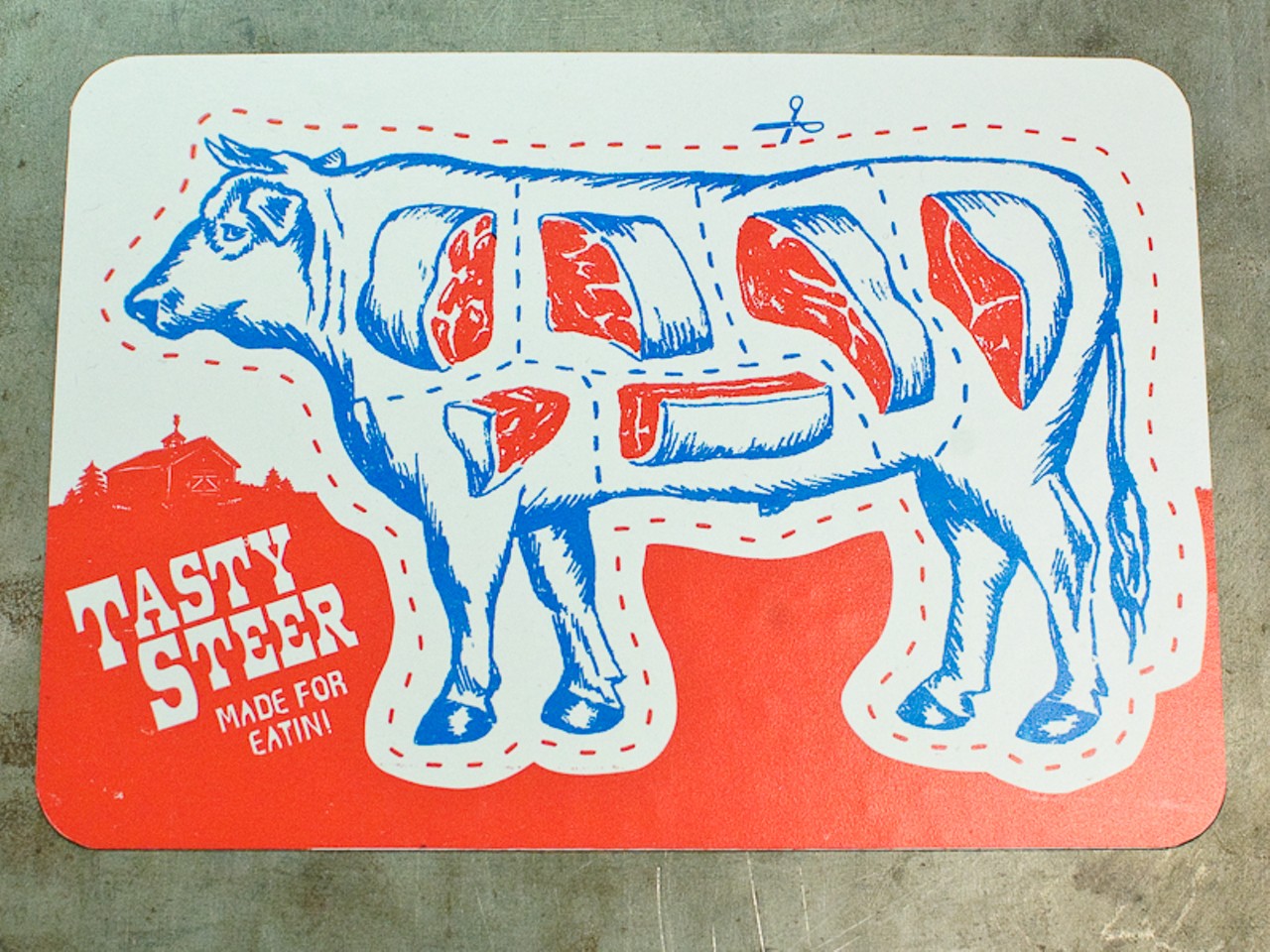 The Firecracker Press, an organizer of the Cherokee Print League&rsquo;s sale, had Tasty Steer stickers available for purchase. It&rsquo;s an educational piece.