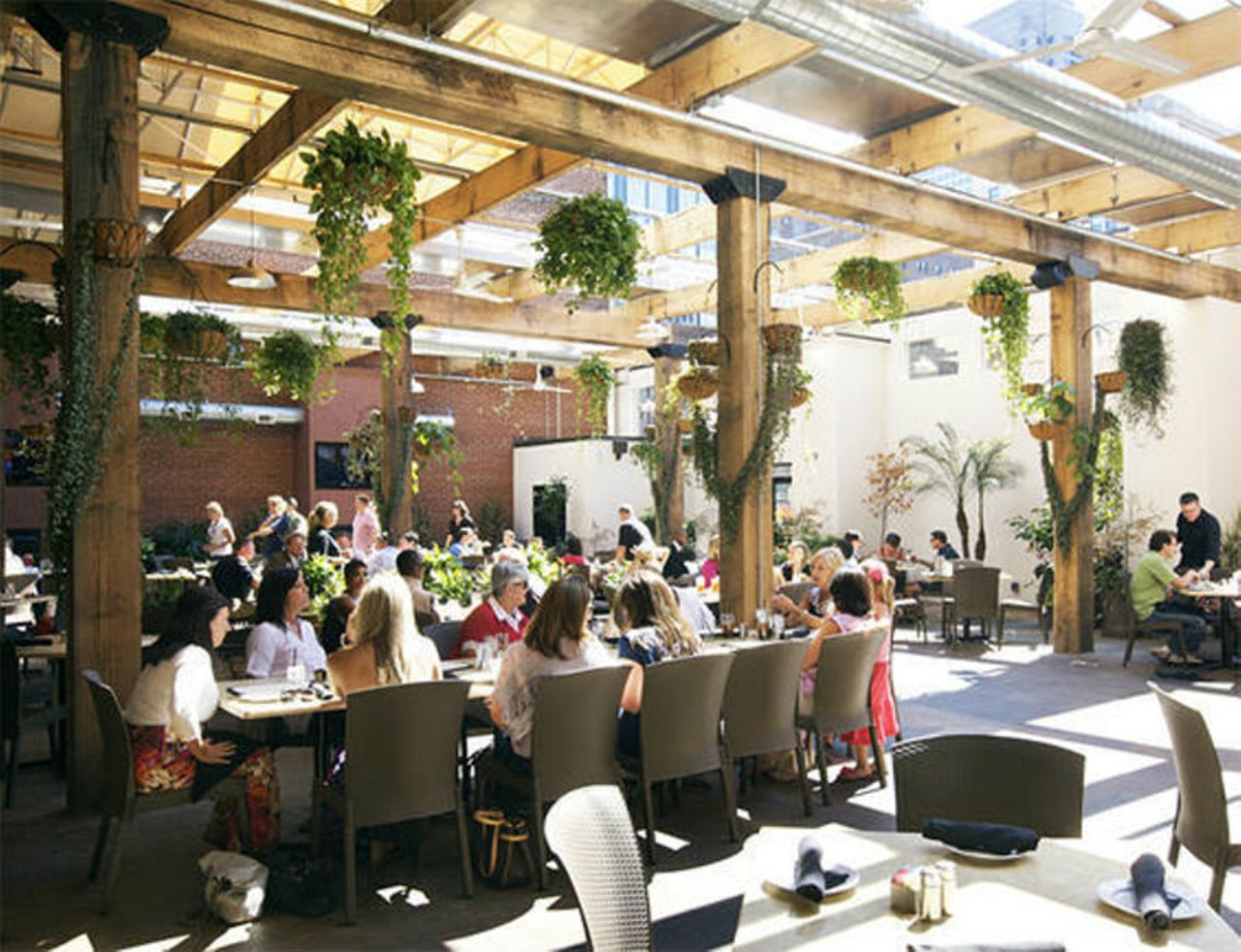 Copia Restaurant & Wine Garden
Who says you have to sacrifice sunshine and open air when you eschew an honest-to-goodness winery for a wine bar in the city? The garden at Copia Restaurant & Wine Garden (1122 Washington Avenue, 314-241-9463) has a retractable roof, making it accessible year-round. The walls provide a rare bit of privacy in the heart of downtown, while you'll still get the dose of sunshine and fresh air you desire. Photo by Jennifer Silverberg.