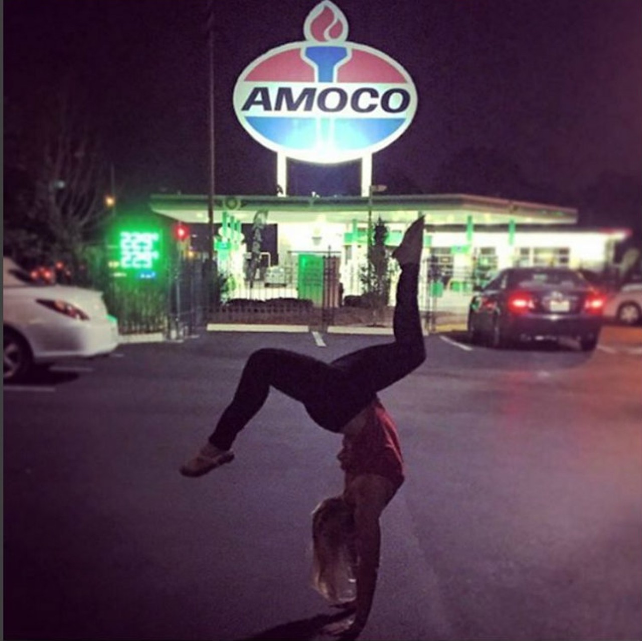 The giant Amoco signBonus points if you can pull off a pose like this. Photo courtesy of Instagram / lharvath.