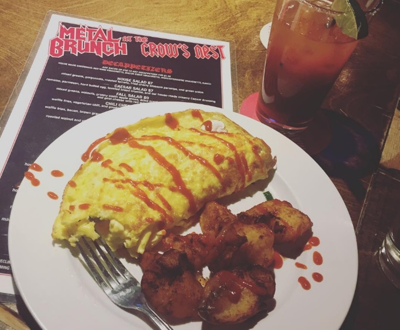 When You Want a Side of the Dark Lord With Your Omelet: Crow&#146;s Nest
Jazz brunch? So 1950. Try a metal brunch for a darker way to dine. Serving up everything from Decappetizers to Mercyful Plates, Judas Feasts to Geno-sides, the Crow&#146;s Nest (7336 Manchester Road, Maplewood; 314-781-0989) delivers a heaping helping of Beelzebub with its brunch fare. Each Saturday from 11 a.m. to 3 p.m. and Sundays from 10 a.m. to 3 p.m., the Maplewood eatery&#146;s &#147;Metal Brunch&#148; includes a sprawling menu of delicious food and a soundtrack that would satisfy even the most discerning headbanger. On Saturdays Dr. Dan the Pancake Man is on hand to whip up his culinary creations &#151; ask him to make you a pancake that looks like the devil, then worship it. Photo courtesy of Instagram / cort_gabel.