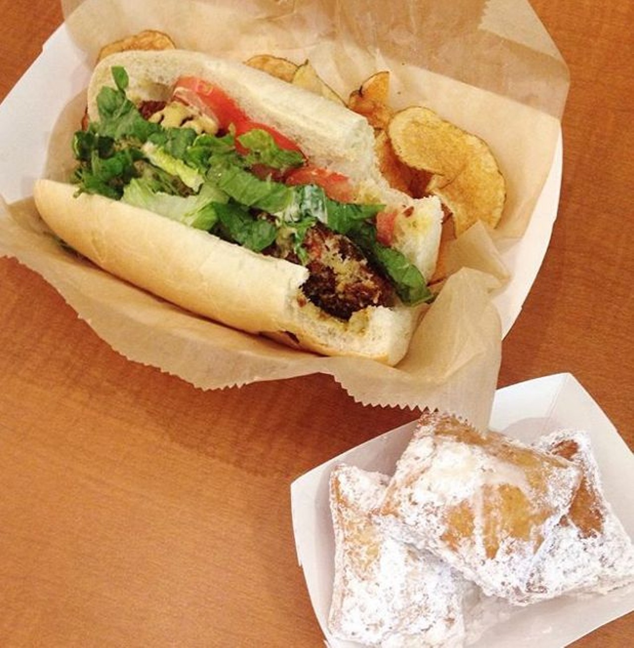 Here we have a crab cake po'boy and beignets. Suddenly we're really hungry...Photo courtesy of Instagram / sydbecker.