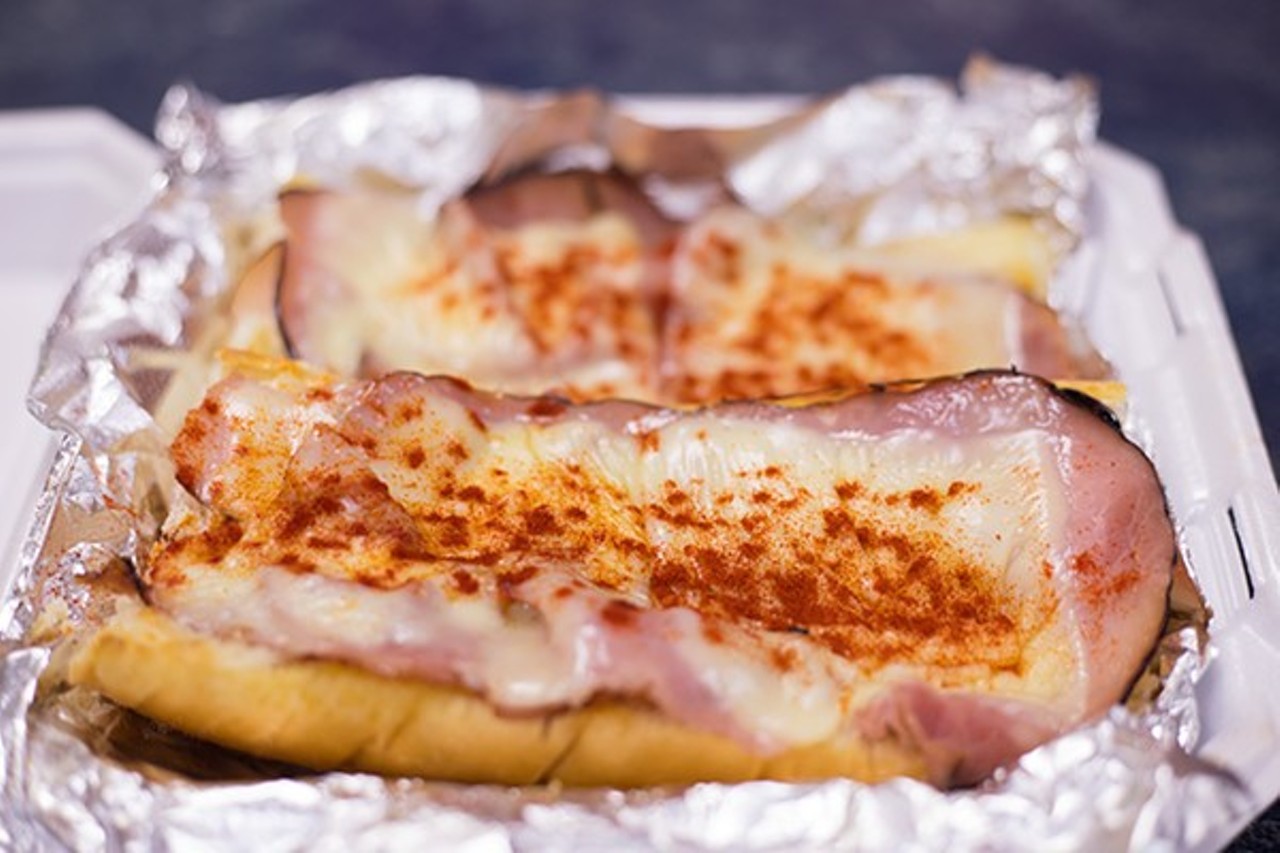 Gerber Sandwich
What's better than cheesy garlic bread? Cheesy garlic bread topped with ham, of course. This open-faced sandwich is a molten mess of buttery garlic bread, Provel cheese, ham and a paprika garnish.
Photo credit: Mabel Suen
