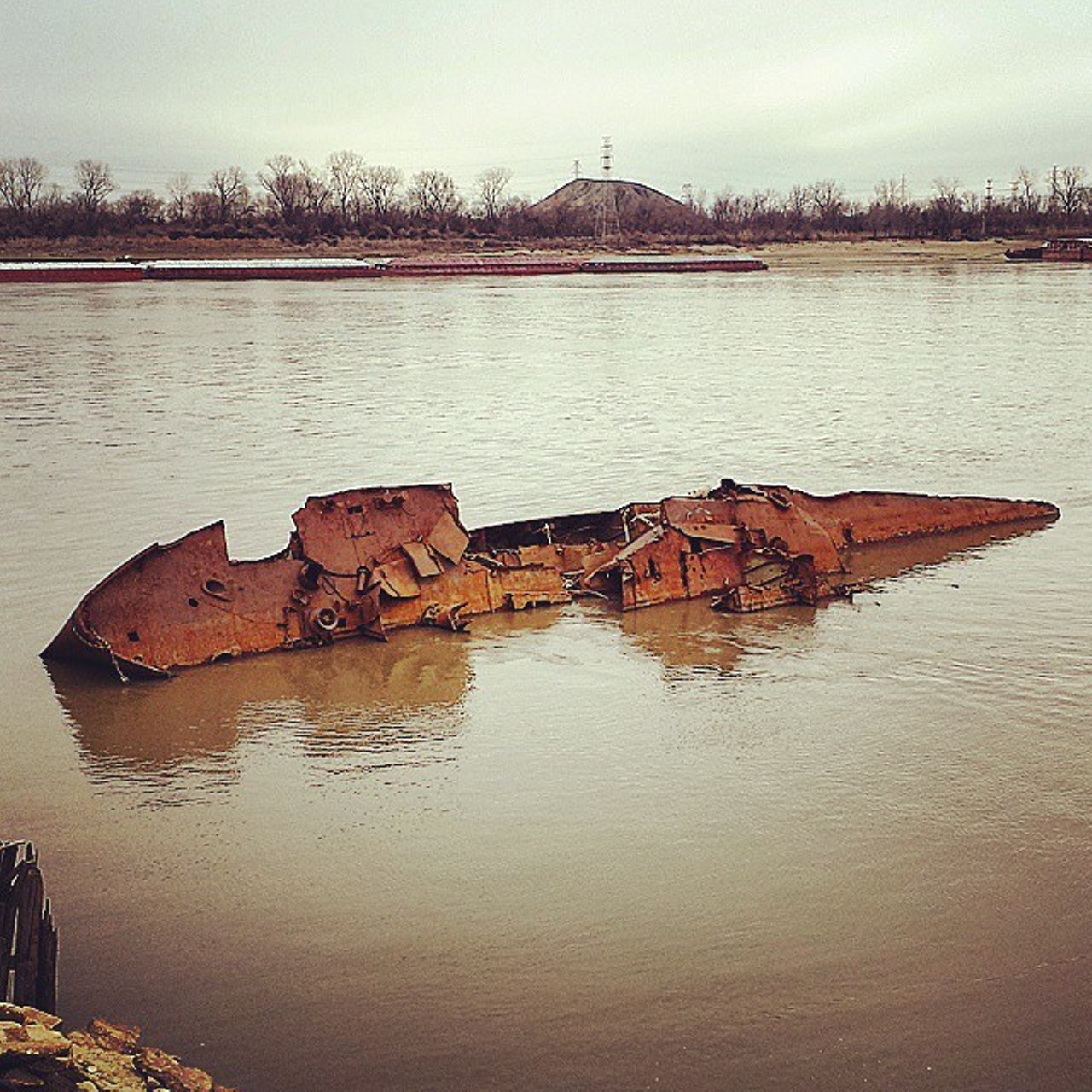 Wreckage Of The USS Inaugural
Rutger St., St. Louis, MO
This mine sweeper was a museum ship in St. Louis until the flood of '93, when it was swept downriver. It's now stuck to the side of the river in south city and you can visit it when the water level is low.
Photo courtesy of bigb80 / Instagram