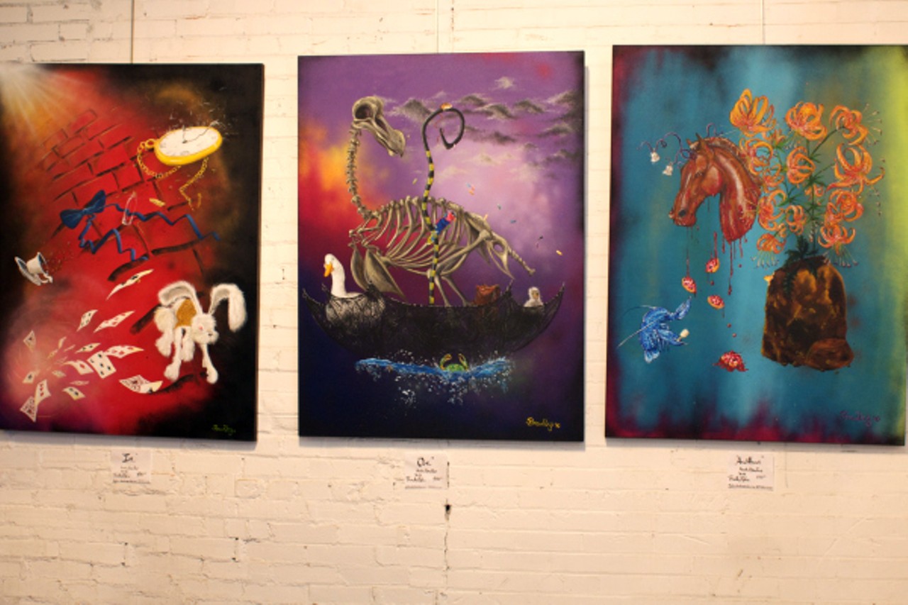 "In" "Out" "And About" are 3 huge paintings showing a more dreamlike Wonderland and were submitted by artist Bradley Pipkin.