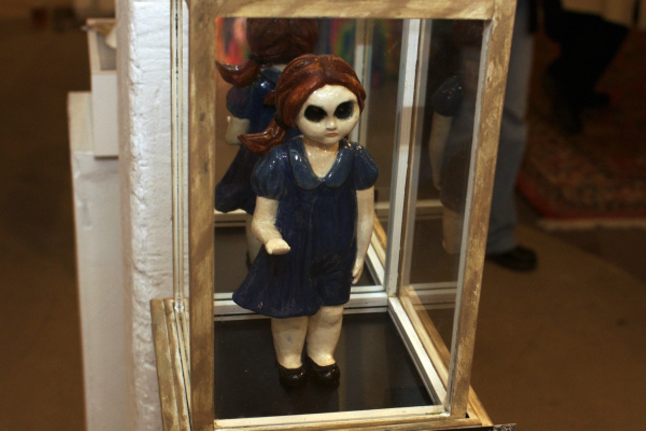 This little ceramic girl is part of a series of statues that Shannon Piwowarczyk feels are a reflection of her inner self which she titled "Come Play." It was selling for $300, stand included.
