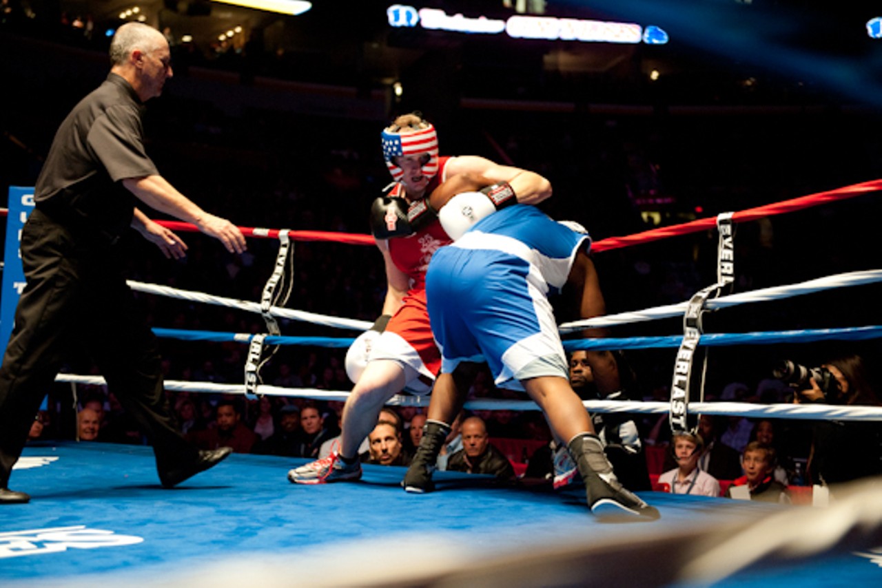 Cops and firefighters trading punches for charity at Guns 'N' Hoses.