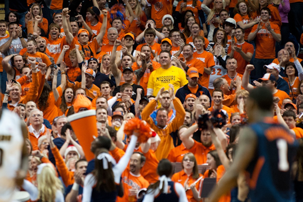 A lone Tigers fan surrounded by a sea of Fighting Illini faithful.