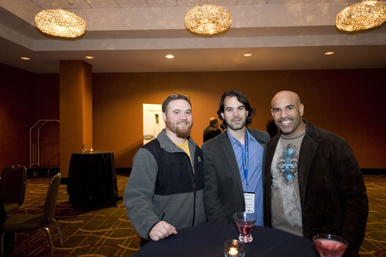 Adam Collins, 23 Minutes to Sunrise cinematographer Chris Benson and Gilberto Pinela at the closing reception for SLIFF.