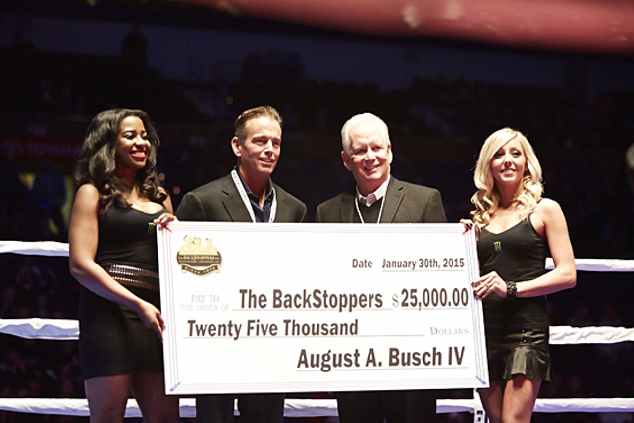 August Busch IV presents a check to the Backstoppers.