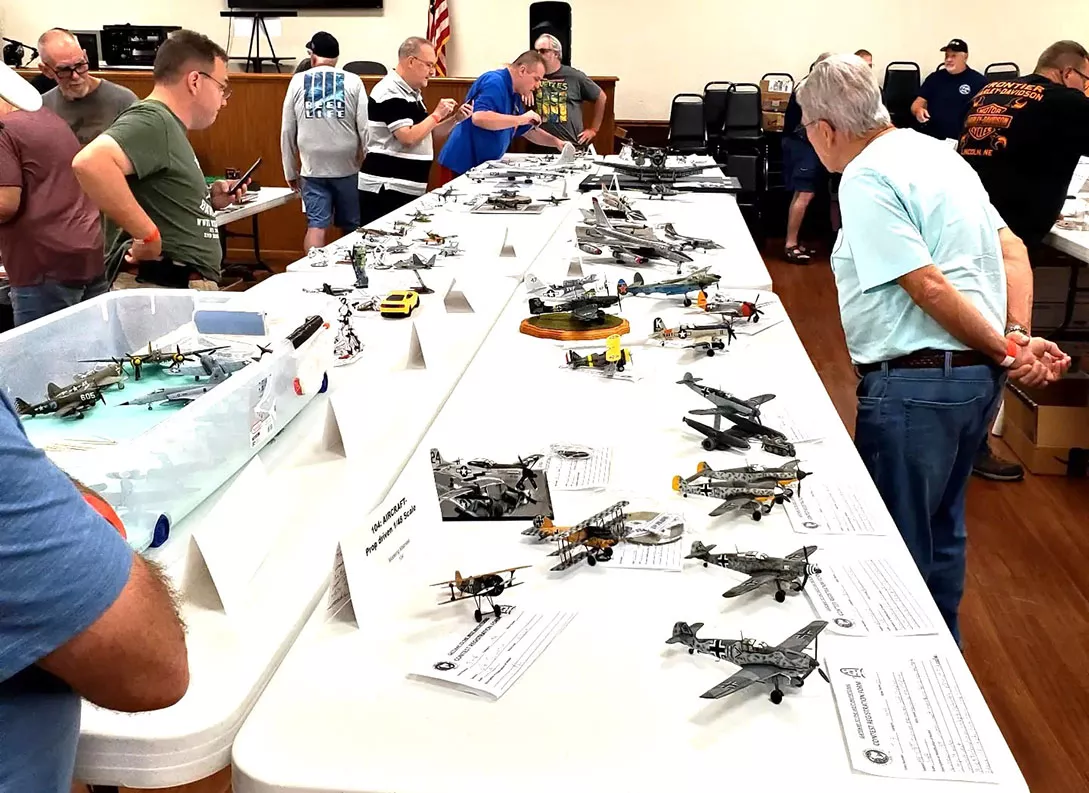 Attendees admire contest models at the 2023 IPMS Gateway to the West Invitational.