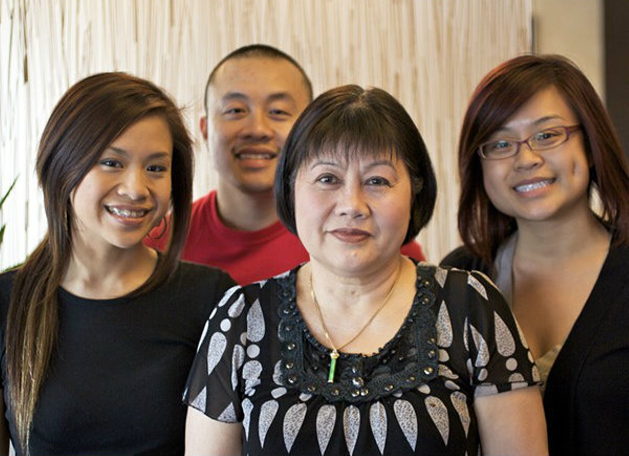 Mai Lee owner Lee Tran (center, pictured with her children in 2010) opened her restaurant shortly after immigrating to the United States, starting with Chinese food and then including food from her native Vietnam. Photo by Jennifer Silverberg.