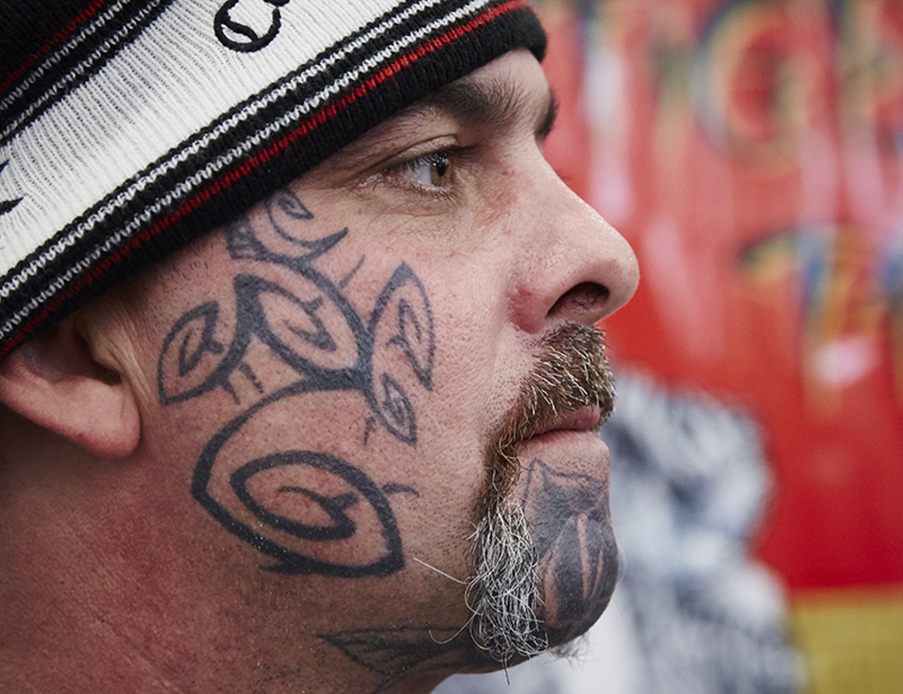 Chula Tupper with his cheek tattoo.